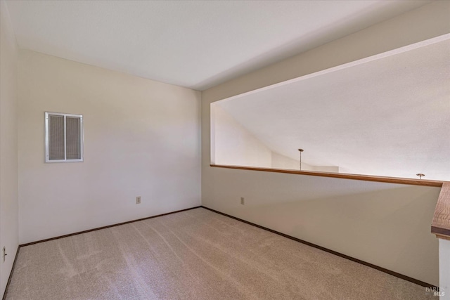 empty room featuring carpet flooring