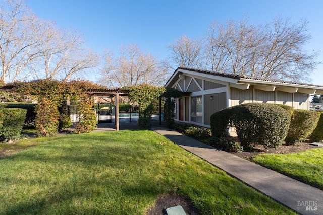 view of property exterior featuring a lawn