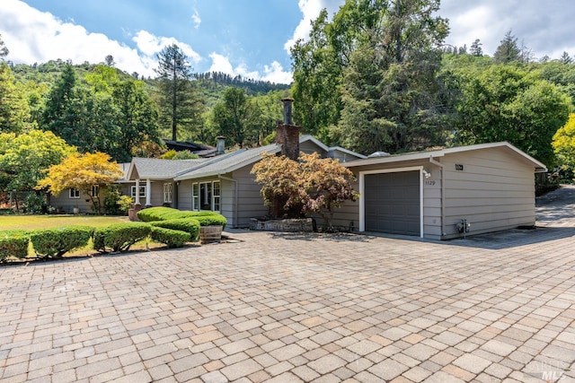 ranch-style home with a garage