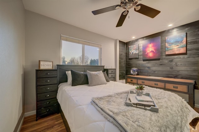 bedroom with hardwood / wood-style floors and ceiling fan