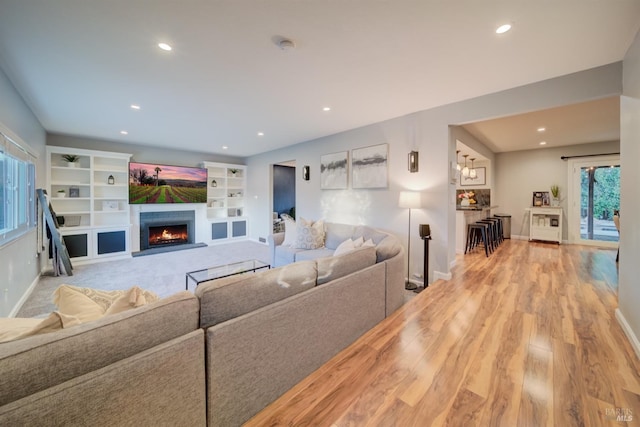 living room with light hardwood / wood-style flooring