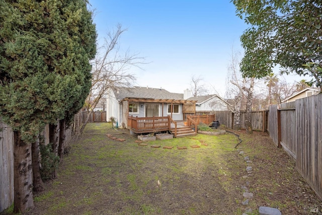 back of house with a wooden deck