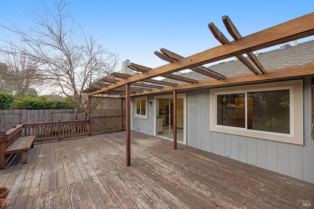 wooden deck featuring a pergola