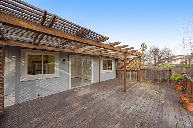 wooden deck featuring a pergola