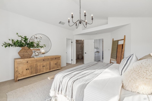 bedroom with light carpet, connected bathroom, an inviting chandelier, and vaulted ceiling