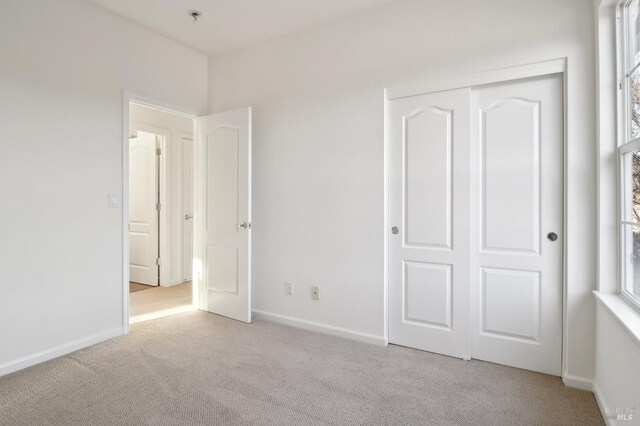 garage featuring baseboards and a garage door opener