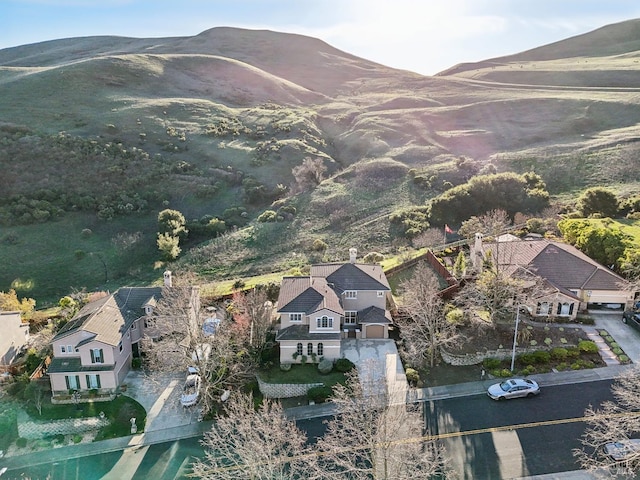 drone / aerial view featuring a mountain view