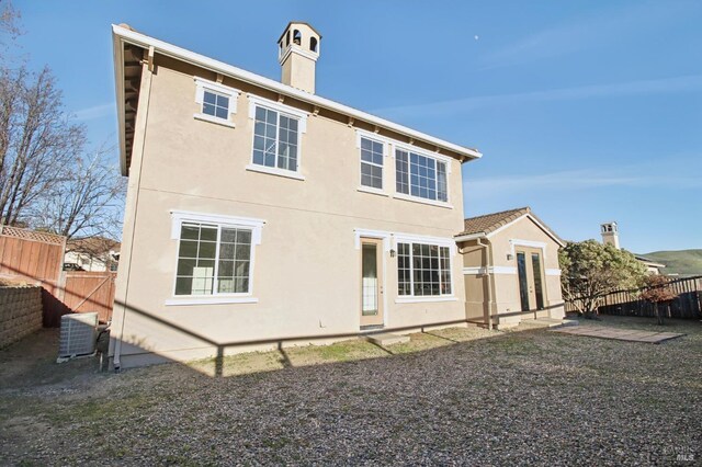 birds eye view of property featuring a residential view and a water and mountain view