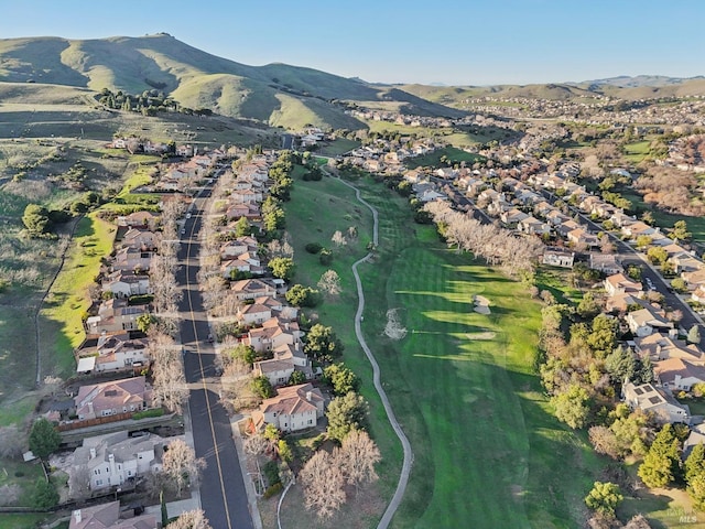 birds eye view of property with a mountain view