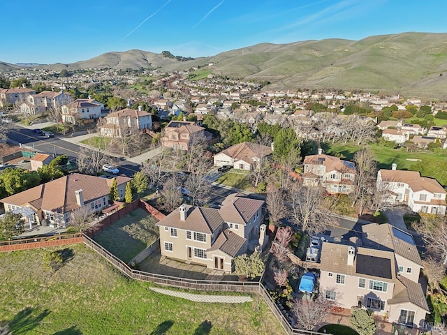 drone / aerial view featuring a mountain view