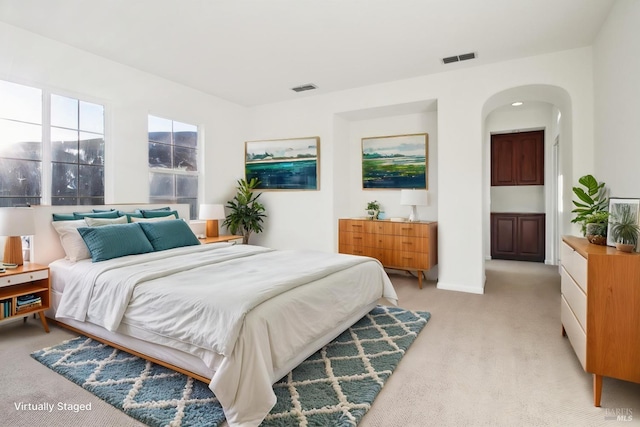 empty room featuring visible vents and baseboards