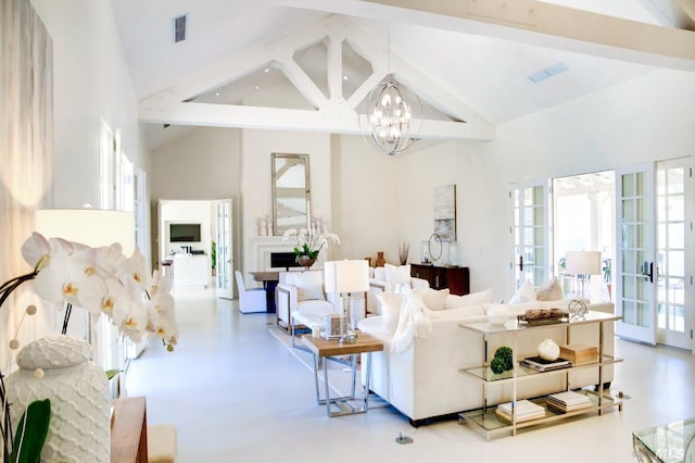 living room featuring high vaulted ceiling, visible vents, french doors, an inviting chandelier, and finished concrete floors