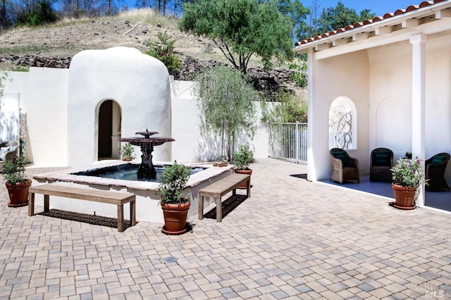 view of patio with fence