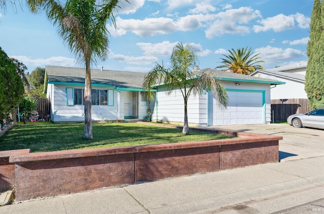 single story home with a garage and a front lawn