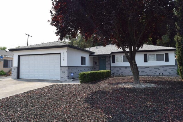 ranch-style house featuring a garage