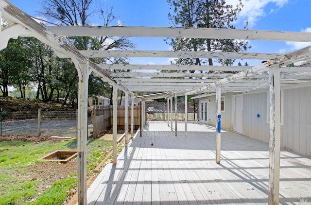 view of patio with fence, a deck, and a pergola