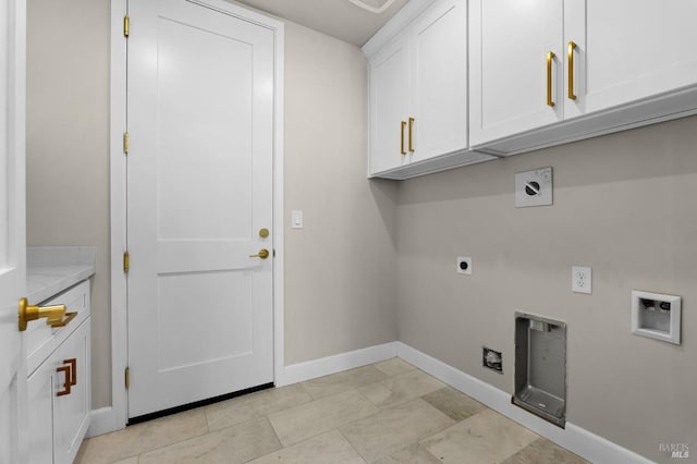 laundry room featuring cabinets, electric dryer hookup, and hookup for a washing machine