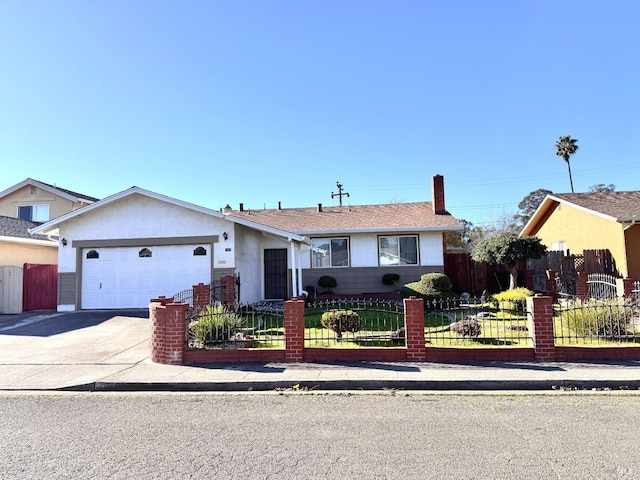 single story home featuring a garage