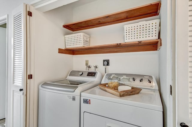 laundry area featuring independent washer and dryer