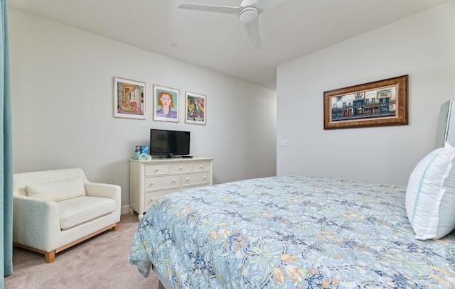 bedroom featuring ceiling fan and light colored carpet