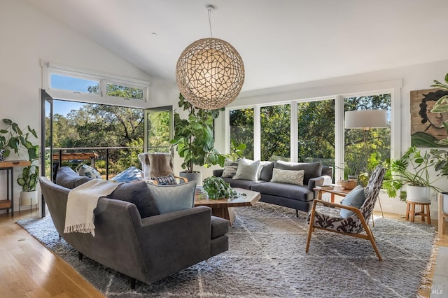 sunroom / solarium with lofted ceiling