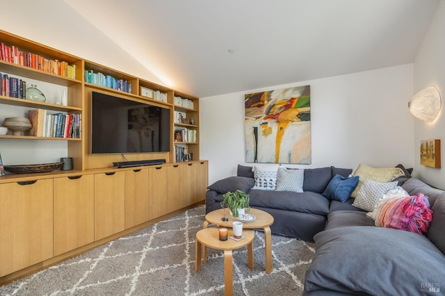 living room with dark carpet and lofted ceiling