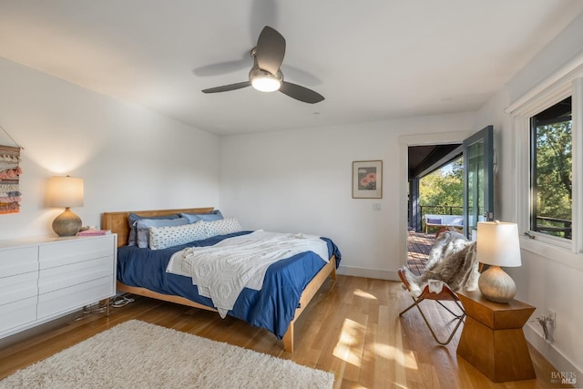 bedroom with ceiling fan and hardwood / wood-style floors