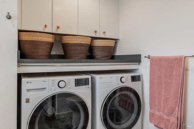 laundry room with separate washer and dryer