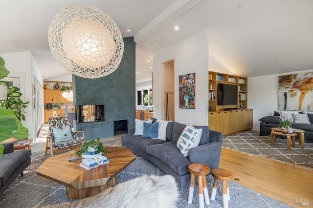 living room featuring hardwood / wood-style floors and a towering ceiling