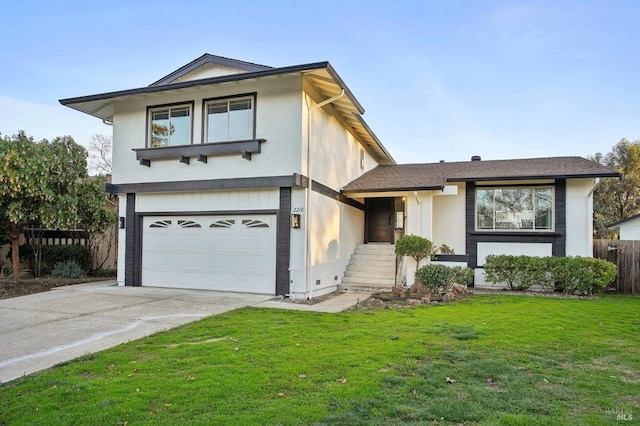 view of front facade featuring a garage and a front lawn