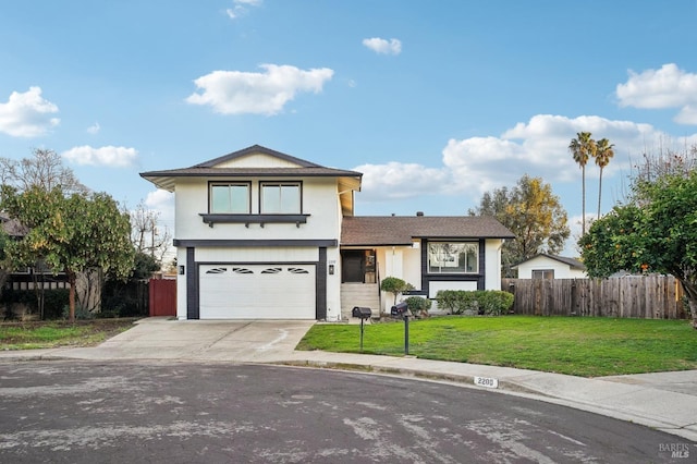 front of property with a garage and a front yard