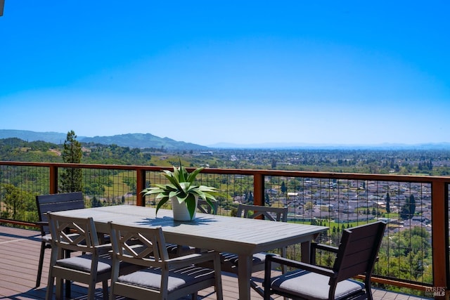 wooden deck featuring a mountain view