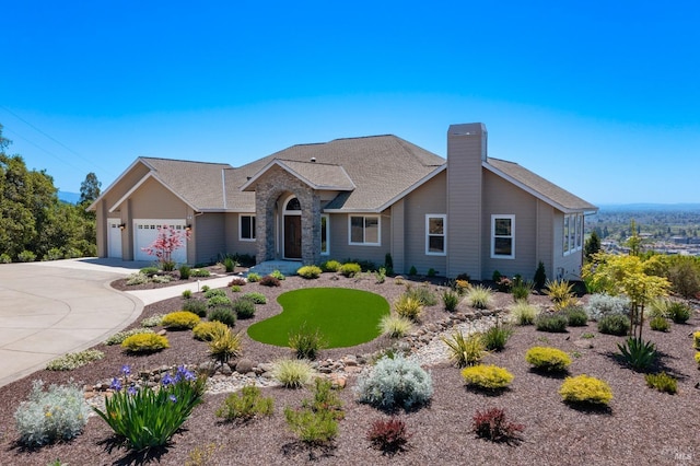 view of front of property with a garage