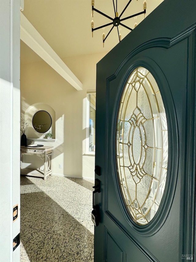 view of carpeted entrance foyer