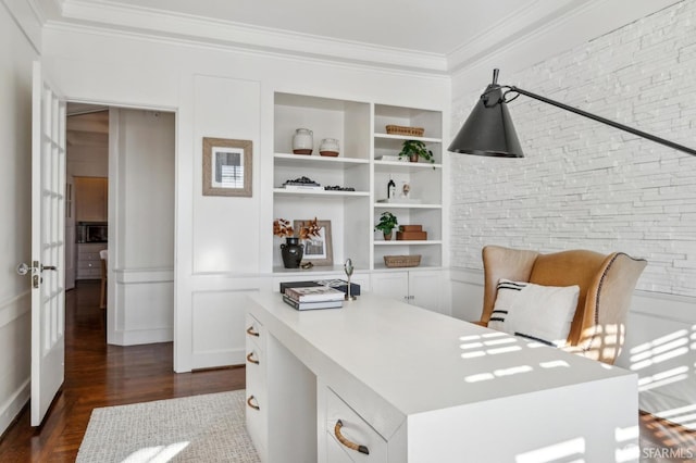 office featuring built in shelves, dark hardwood / wood-style flooring, and crown molding