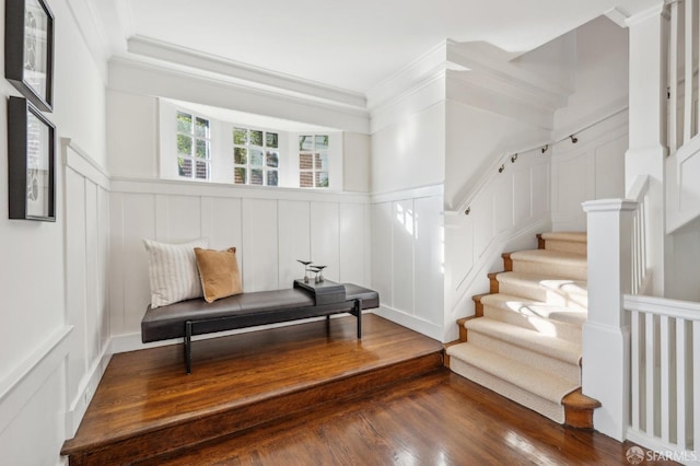 sitting room featuring dark hardwood / wood-style flooring and ornamental molding