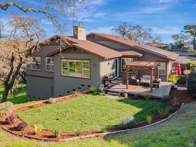 rear view of property featuring a pergola, a deck, and a yard