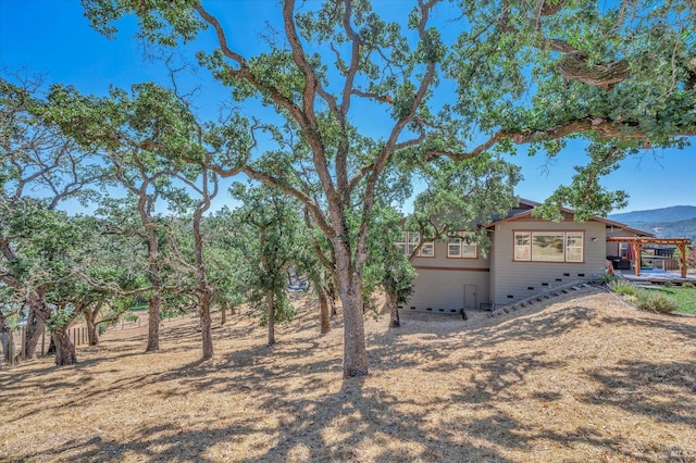 exterior space featuring a mountain view