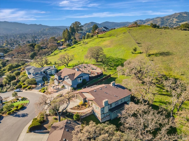 drone / aerial view featuring a mountain view