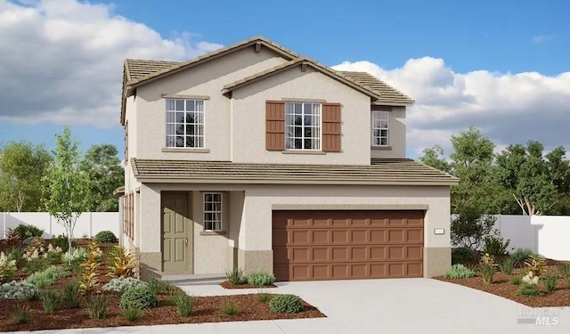 traditional-style house featuring a tile roof, stucco siding, an attached garage, fence, and driveway