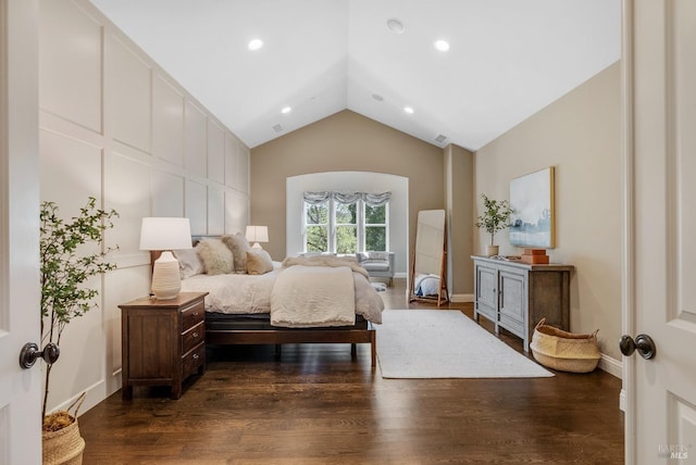 bedroom featuring vaulted ceiling and dark hardwood / wood-style floors