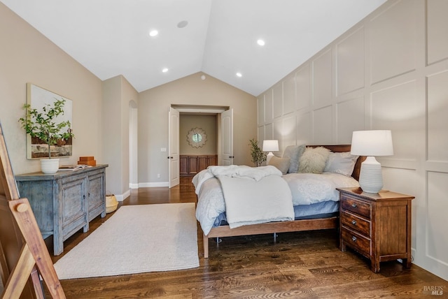 bedroom with dark hardwood / wood-style flooring and vaulted ceiling