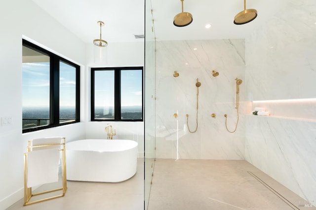 bathroom with tiled shower