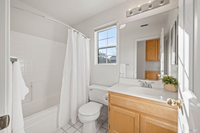 full bathroom with toilet, vanity, tile patterned flooring, and shower / bath combo