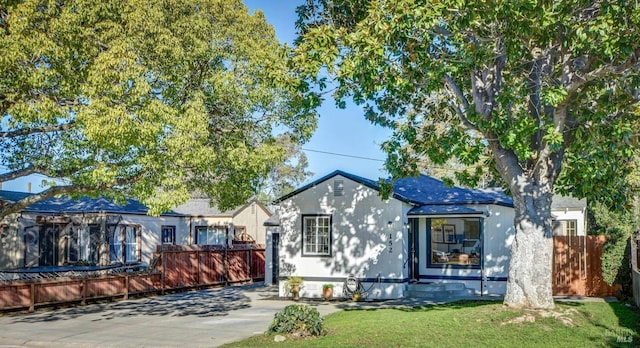 view of front of home with a front yard