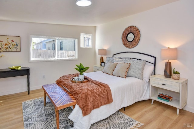 bedroom with light hardwood / wood-style flooring