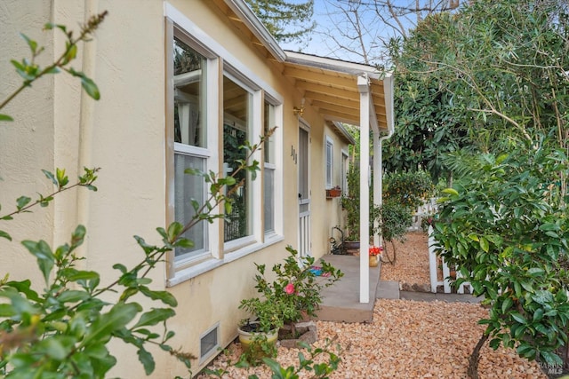 view of property exterior featuring a patio