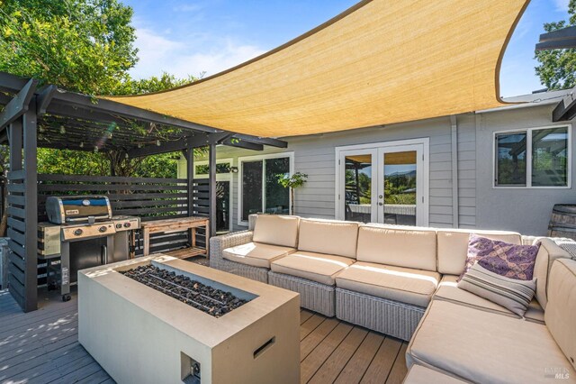 wooden deck featuring an outdoor hangout area