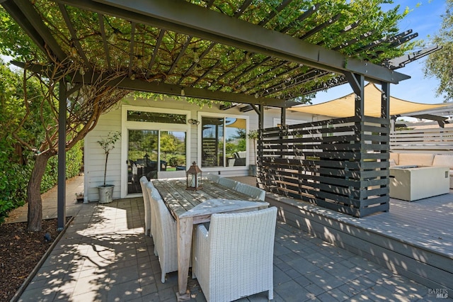 view of patio with a deck and a pergola