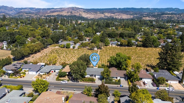 drone / aerial view with a residential view and a mountain view